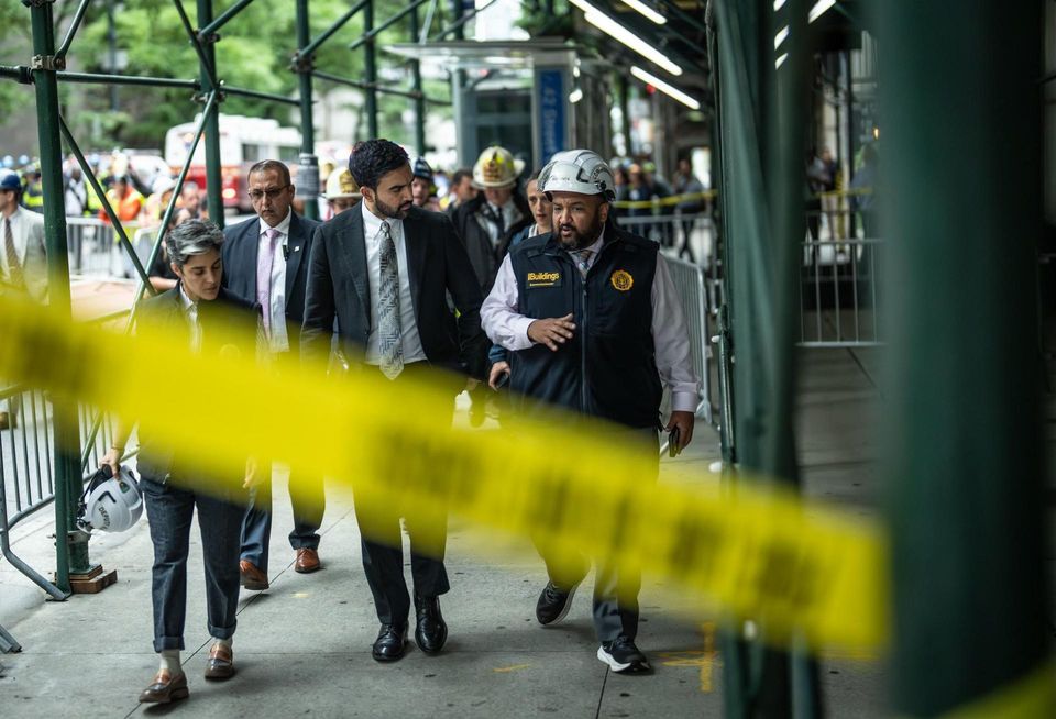 Mayor Zohran Mamdani and Deputy Mayor for Housing Leila Bozorg being briefed by DOB Commissioner Ahmed Tigani on the collapse threat at the Pfizer building on July 7.