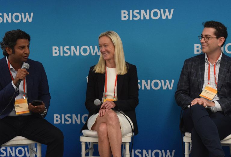 Prescriptive Data's Sonu Panda, Nuveen Green Capital's Jessica Bailey and PACE Loan Group's Rafi Golberstein on stage at Bisnow's National Finance Summit in 2022.