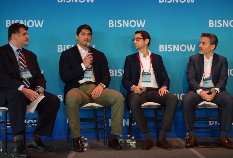 Cole Schotz's Emanuel Tsourounis, Square Mile's Samir Tejpaul, KKR's Paul Fine and Nuveen Real Estate's Jason Hernandez on stage at Bisnow's New York Future Forum in January 2023.
