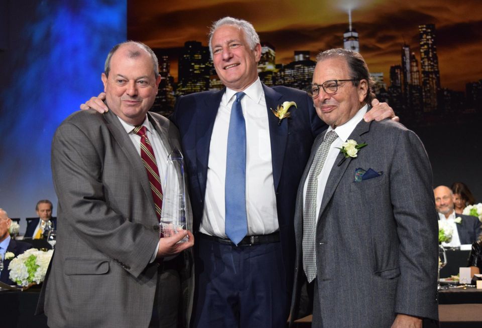 REBNY's Whelan (L) and Durst (R) presenting Target ALS Founder and Chairman Dan Doctoroff with the 2023 John E. Zuccotti Public Service Award at real estate's biggest annual bash.
