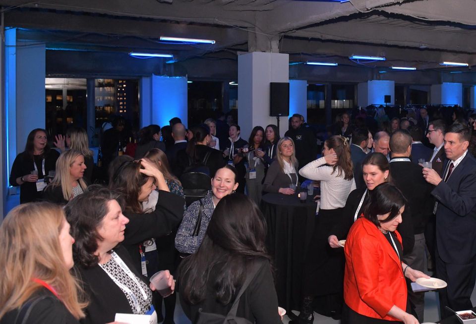Crowds networking at Bisnow's 2023 New York Women Leading Real Estate event.