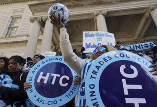 Hotel workers rallying outside City Hall in February this year.