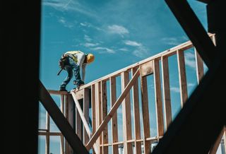 Man building house housing homebuilder 