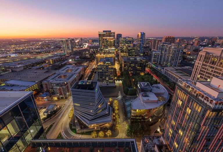 Nighttime aerial view of the Harwood District in DFW.