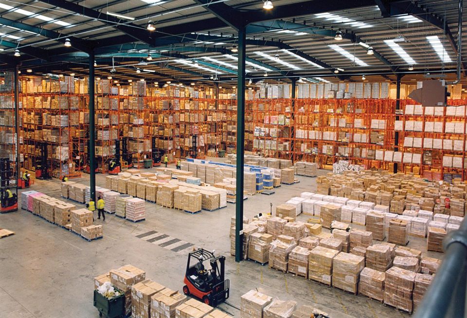 warehouse racks boxes rows pallets