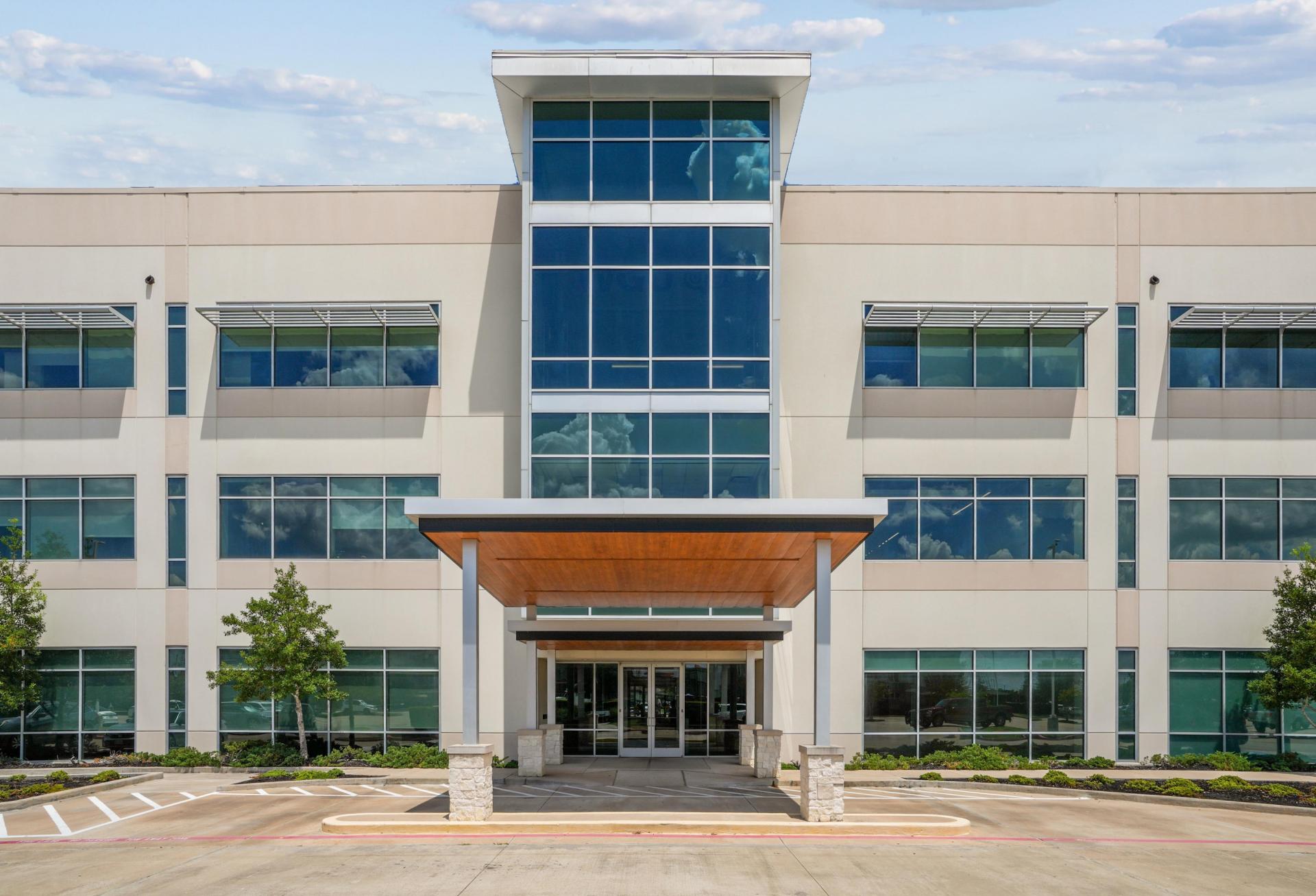 The entrance and exterior of a three-story medical office building