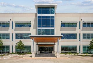 The entrance and exterior of a three-story medical office building