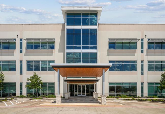 The entrance and exterior of a three-story medical office building