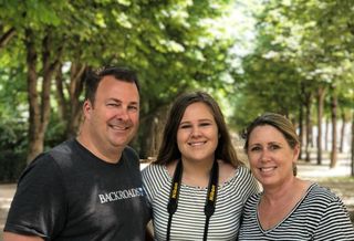 Meridian CEO John Pollock with daughter Jayne and wife Susie in Paris, France.