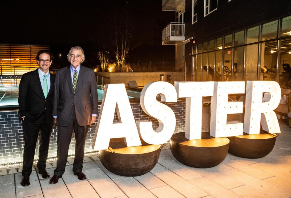 Toby Bozzuto and Tom Bozzuto at the grand opening of the Aster College Park