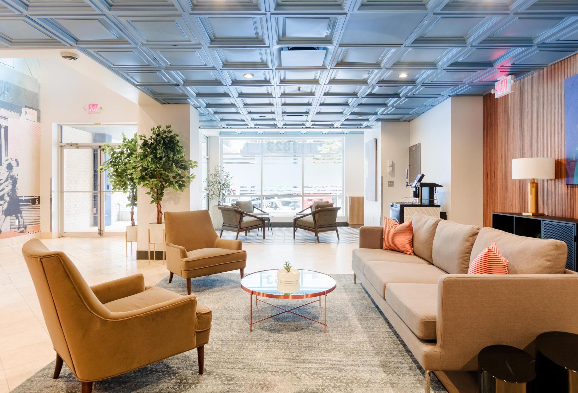 The lobby of The Quincy, a building owned by Urban Investment Partners and operated by short-term rental startup Sonder.