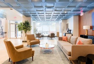 The lobby of The Quincy, a building owned by Urban Investment Partners and operated by short-term rental startup Sonder.