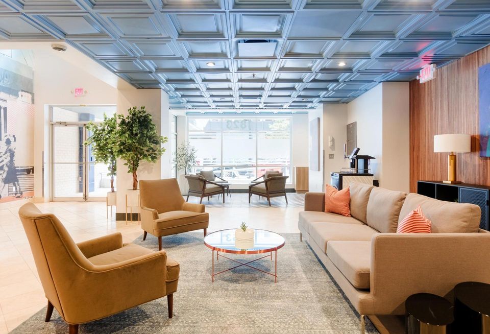 The lobby of The Quincy, a building owned by Urban Investment Partners and operated by short-term rental startup Sonder.