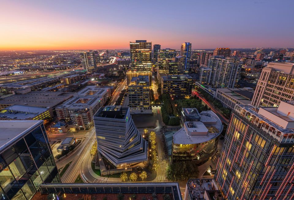 Nighttime aerial view of the Harwood District in DFW.