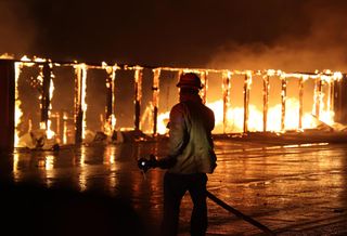 SoCal Wildfire Early Damage Estimate Reaches $52B As Flames Edge Toward Downtown Santa Monica