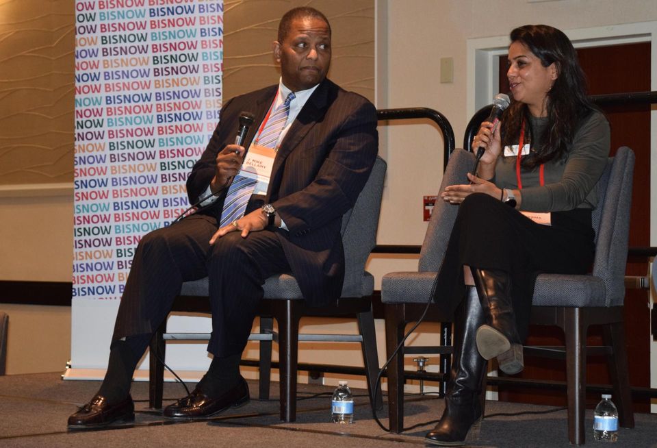 Mike Bellamy, Kaiser Permanente's mid-Atlantic executive director of national facilities, and Naseema Shafi, CEO of Whitman-Walker Health, speak during a panel at Bisnow's 2022 Mid-Atlantic Healthcare Summit.
