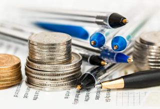 Coins and pens. 