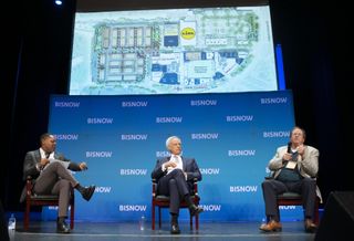WC Smith Chairman and CEO Chris Smith shares plans for the final phase of Skyland Town Center, which include 126 townhomes and a 75-unit senior affordable housing community, during a panel with Rappaport Cos.' Gary Rappaport at Bisnow's Future of Wards 7 and 8 event on Dec. 13, 2022.