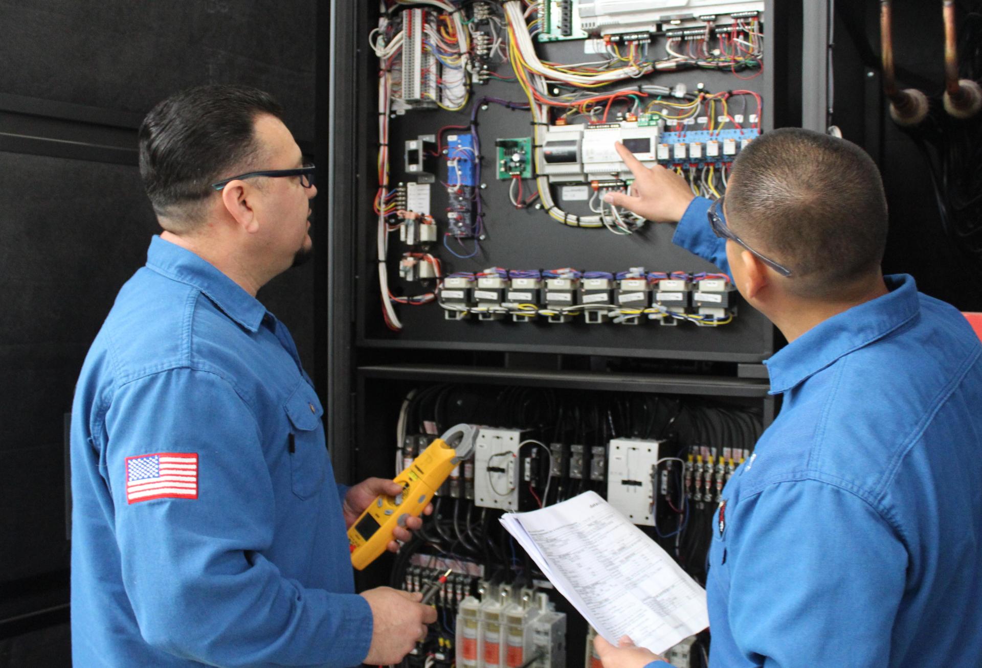 Data Aire technicians service equipment.