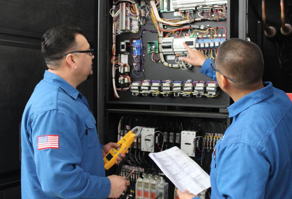 Data Aire technicians service equipment.