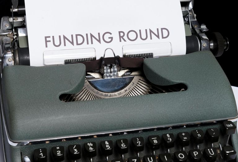 Funding Round Photo Typewriter