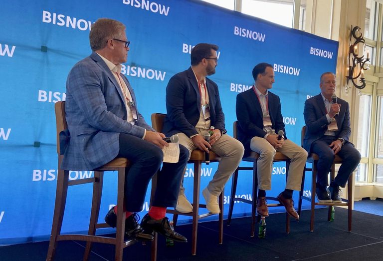 Savills' Roy Hirshland, Boston Global Investors' John Hynes Jr., Carr Properties' Austen Holderness and The HYM Investment Group's Thomas O'Brien at Bisnow's Boston Office: Navigating the Changing Landscape event at Rowes Wharf.