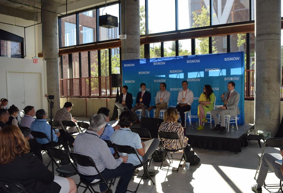 NYC Mayor's Office's Samuel Man, Ecosystem Energy Service's Adam Shelly, Fairstead's Michael Gilbert, REBNY's Zach Steinberg, Code Green's Hannah Bronfman and Fried, Frank, Harris, Shriver & Jacobson's Wesley O'Brien on stage at Bisnow's NYC Sustainability & ESG event in July 2022.