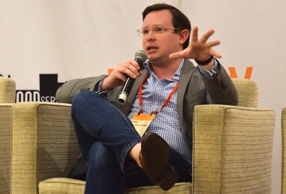 Evan Regan-Levine speaks during a panel at Bisnow's National Landing Update event on March 21, 2022.