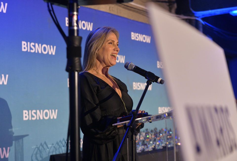 Yael Ron, Silverstein Properties' chief hospitality officer, delivering opening remarks at Bisnow's 2023 New York Women Leading Real Estate event.