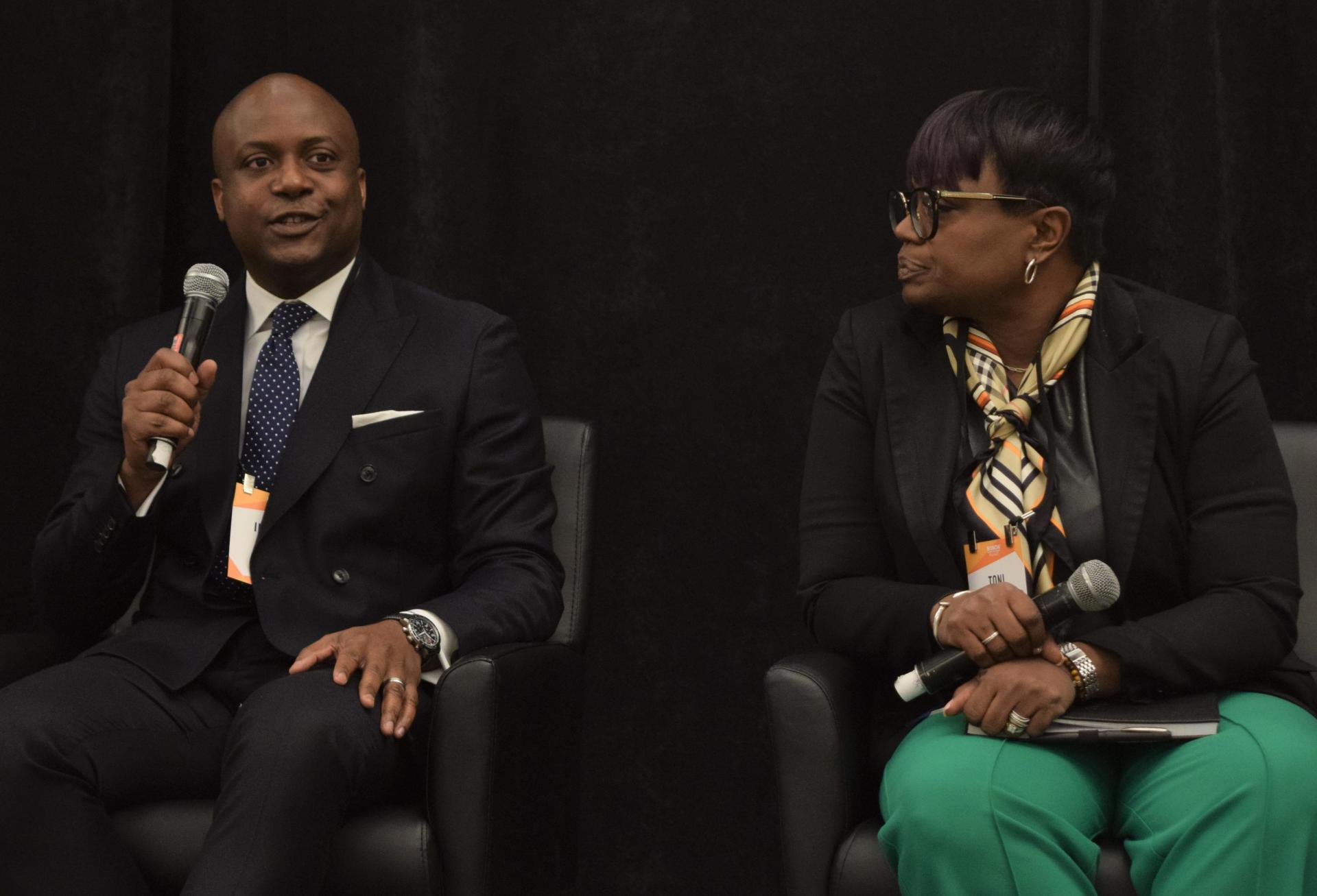Ikeogu Imo, senior vice president at the D.C. Housing Finance Agency and Toni Harris, founder and CEO of KAT Professional Development, speak during a panel at Bisnow's 2022 Mid-Atlantic Senior Housing Summit.