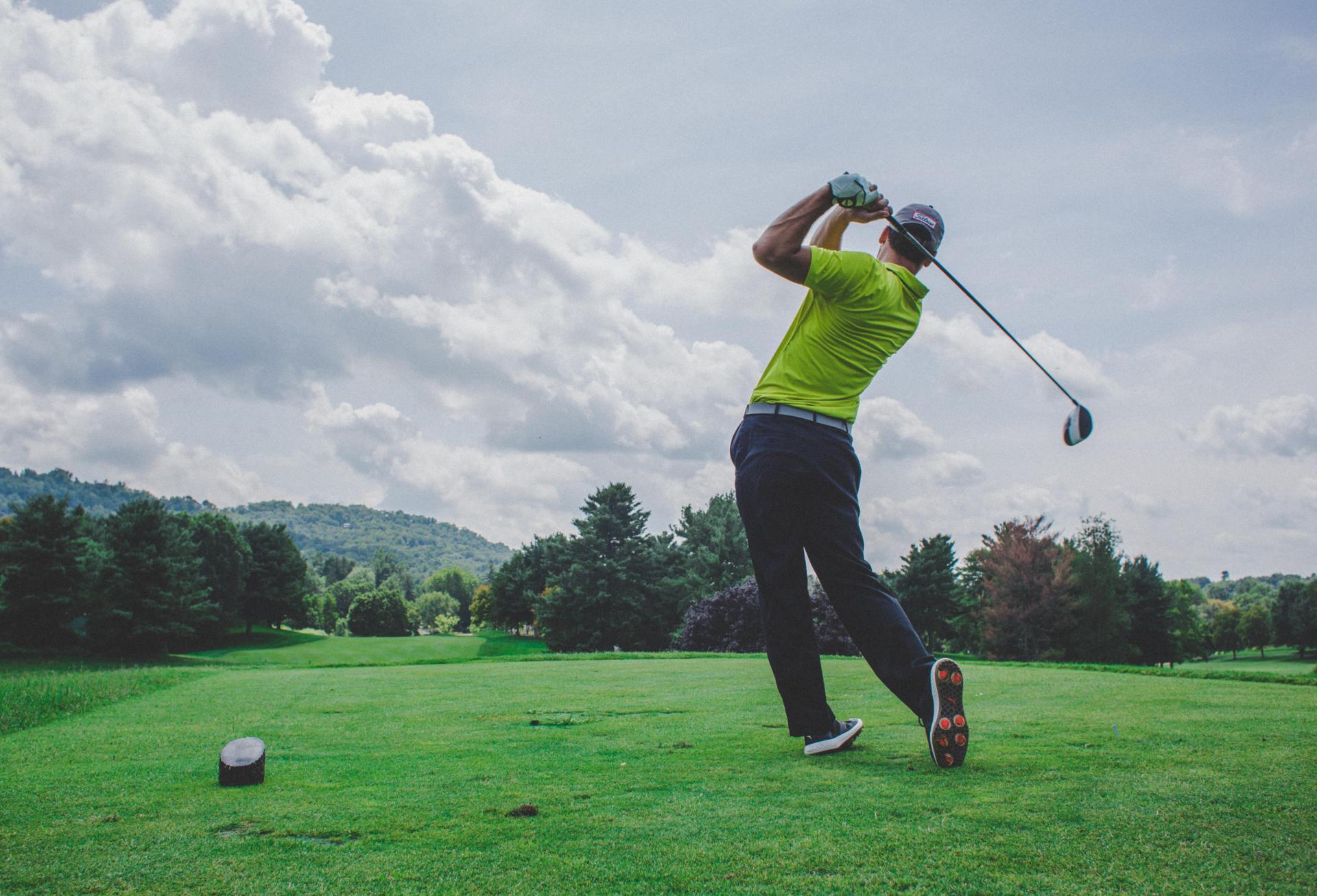 A man golfing 