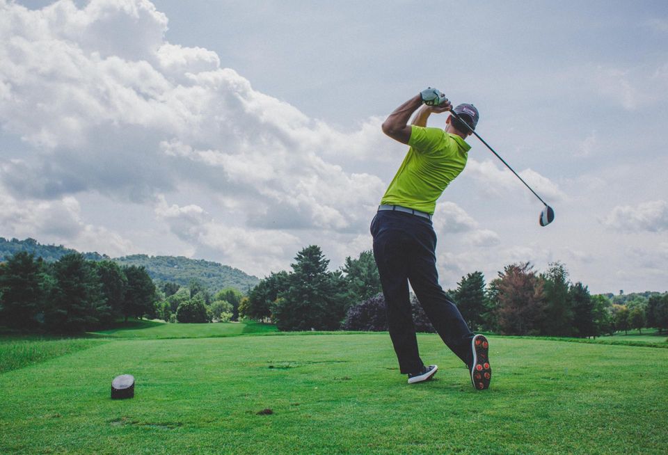 A man golfing