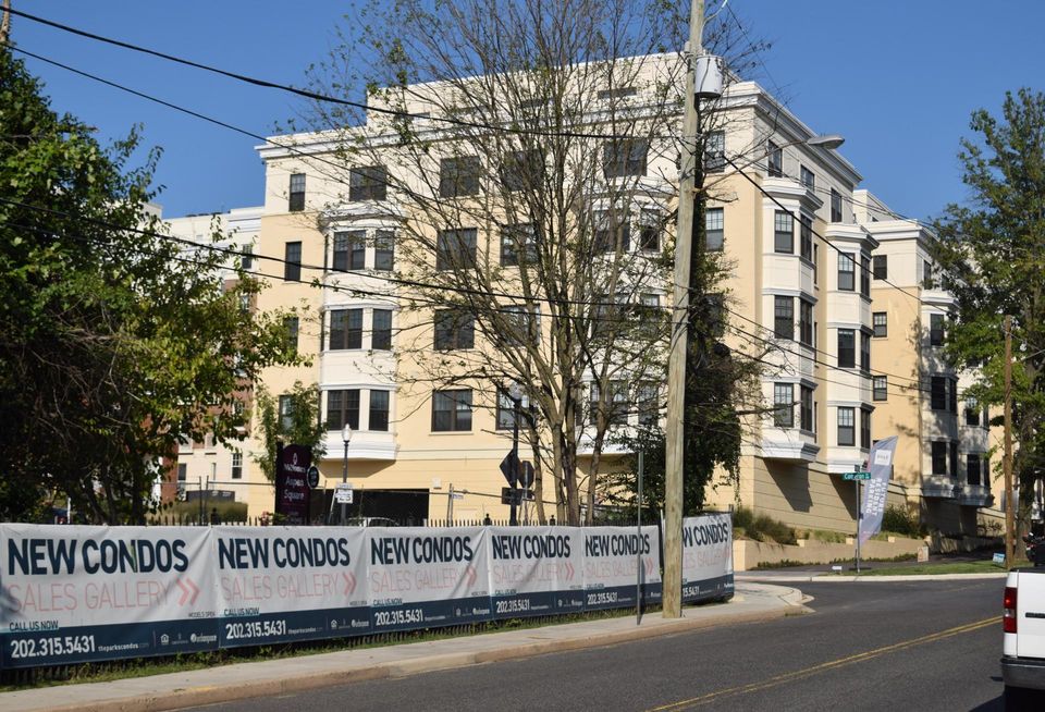 A view of The Vale apartments from Aspen Street. Aspen Square, NVHomes' 50-unit townhome community on The Parks at Walter Reed campus, neighbors The Vale to the west.