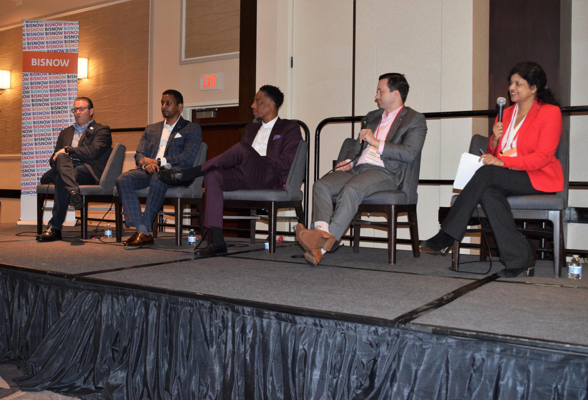 Joe Ochipinti, Michael Crawford, Courtland Wyatt, Daniel Durand and Lakshmi Nalluri speak during a panel at Bisnow's 2022 Mid-Atlantic Healthcare Summit.