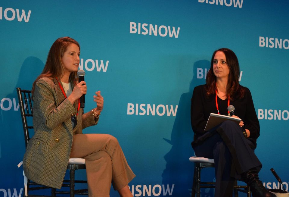 Hines' Sarah Hawkins and Hunton Andrews Kurth's Laurie Grasso on stage at Bisnow's New York Future Forum event in January 2023.