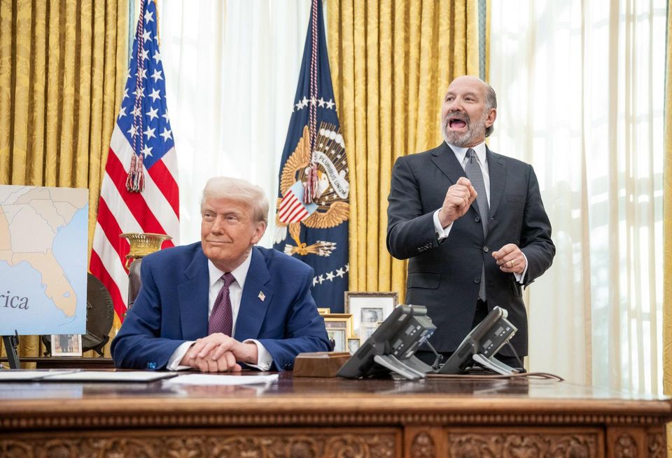 Newmark Chairman Howard Lutnick, nominee for Secretary of Commerce, speaks at the Oval Office next to President Donald Trump.