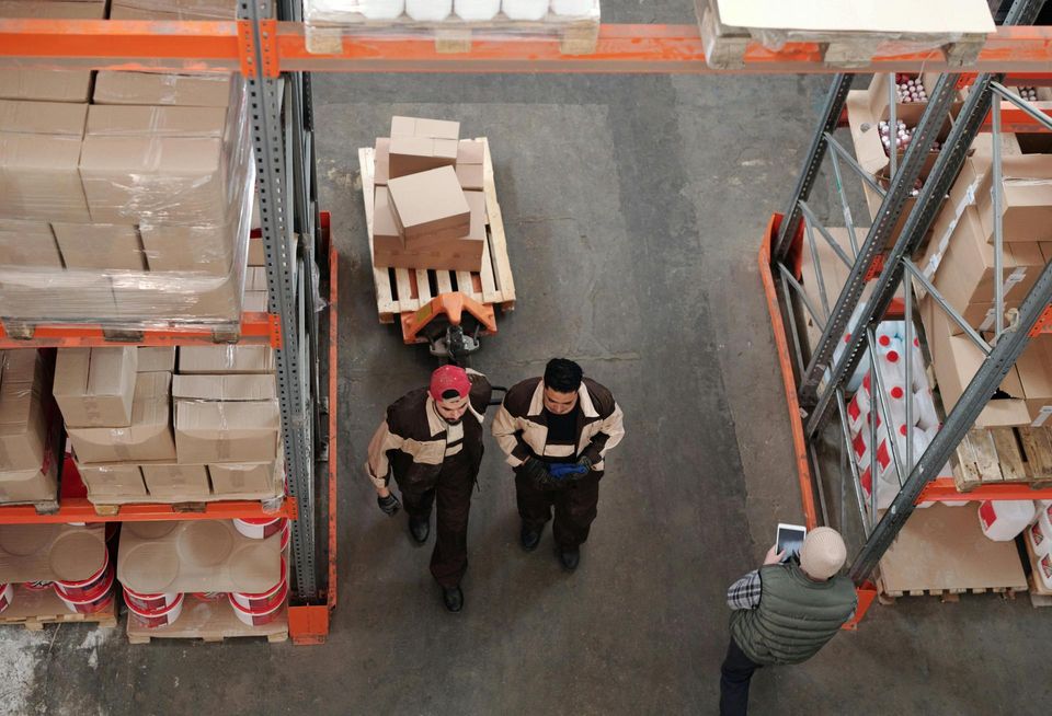 Warehouse industrial workers pallet jack
