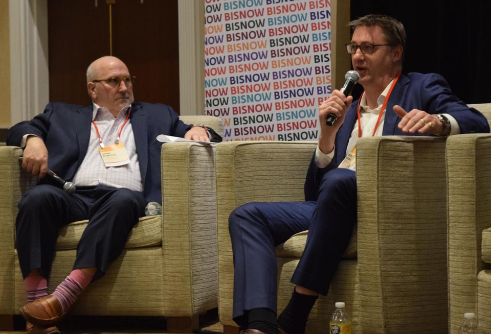 Jamie Bobotek, partner at Pillsbury Winthrop Shaw Pittman, and Geoff Sharpe, vice president of creative planning and development at Federal Realty Investment Trust, speak at Bisnow's National Landing Update event on March 21, 2022