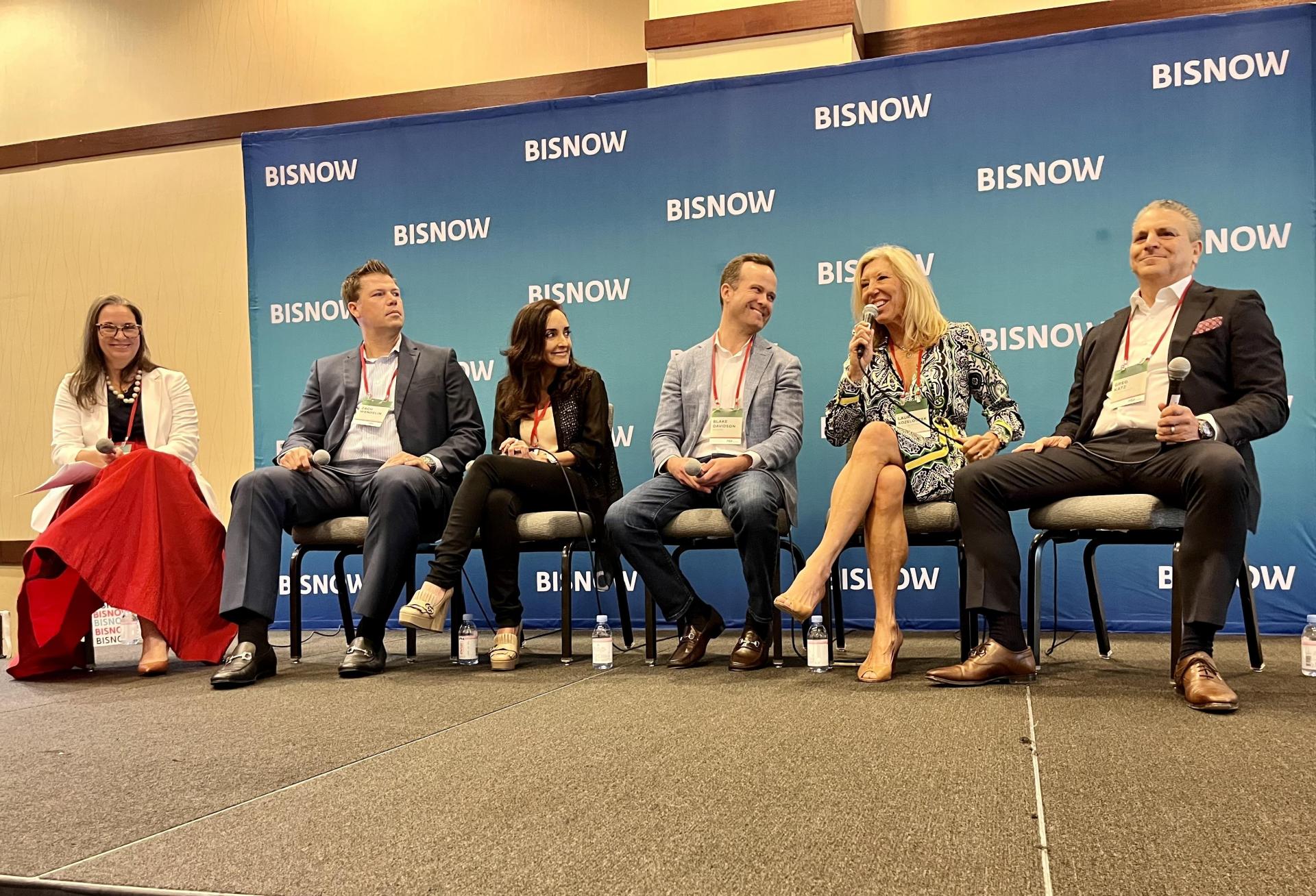 The Common Area's Maureen Mascaro, JLL's Zach Wendelin, AEI's Juliana Fernandez, WeWork's Blake Davidson, Quest Workspaces' Laura Kozelouzek and Stream Realty's Greg Katz on a panel at Bisnow's South Florida Office event April 27, 2023.
