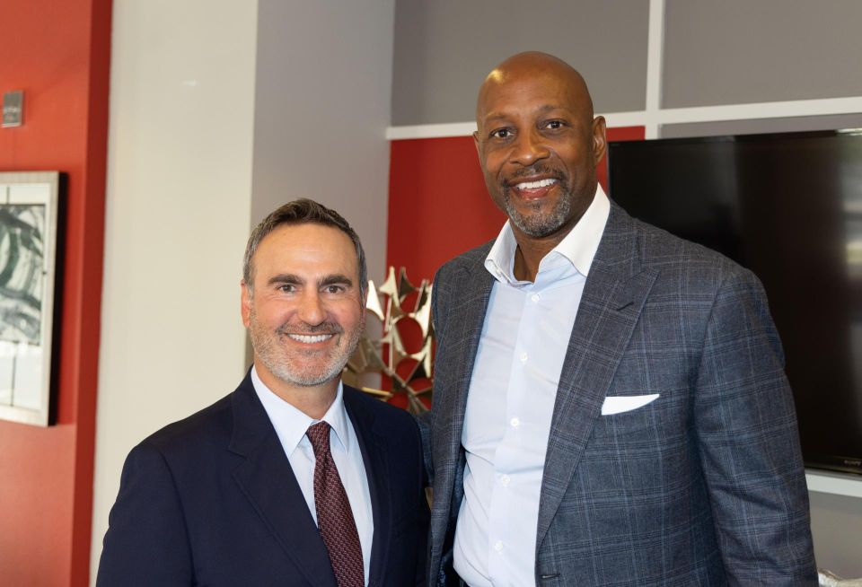 AM Affordable Housing Founder and NBA Hall of Famer Alonzo Mourning alongside business partner Housing Trust Group (HTG)'s CEO Matt Rieger at their first development Courtside Family Apartments in the historic city of Overtown in downtown, Miami located at 1699 Northwest 4th Avenue.