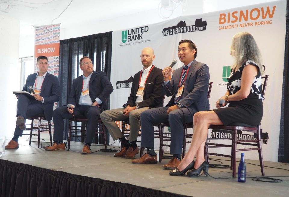 Walsh, Colucci, Lubeley & Walsh's Andrew Painter, AREP's Jason Alexander, Jefferson Apartment Group's Greg Van Wie, Stream Realty's Anthony Chang and Rosslyn BID's Mary-Claire Burick speak during a panel at Bisnow's Future of Arlington County event.