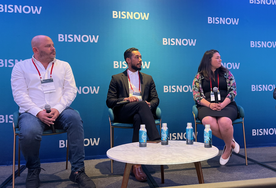 Joy Construction's Eli Weiss, Brooklyn Borough President Antonio Reynoso and NYC HPD's Tricia Dietz onstage at Bisnow's 2024 New York Affordable Housing conference.