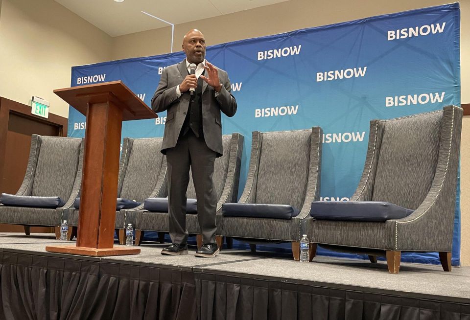 Denver International Airport CEO Phillip Washington gives his keynote address at Bisnow's 2025 Forecast event held at the Embassy Suites Denver Downtown on Jan. 23.
