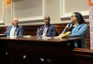 NFP's Eric Sutter, Silverstein Properties' Malcolm Williams and BRP Companies' Mary Serafy onstage at Bisnow's 2024 Construction & Development event.