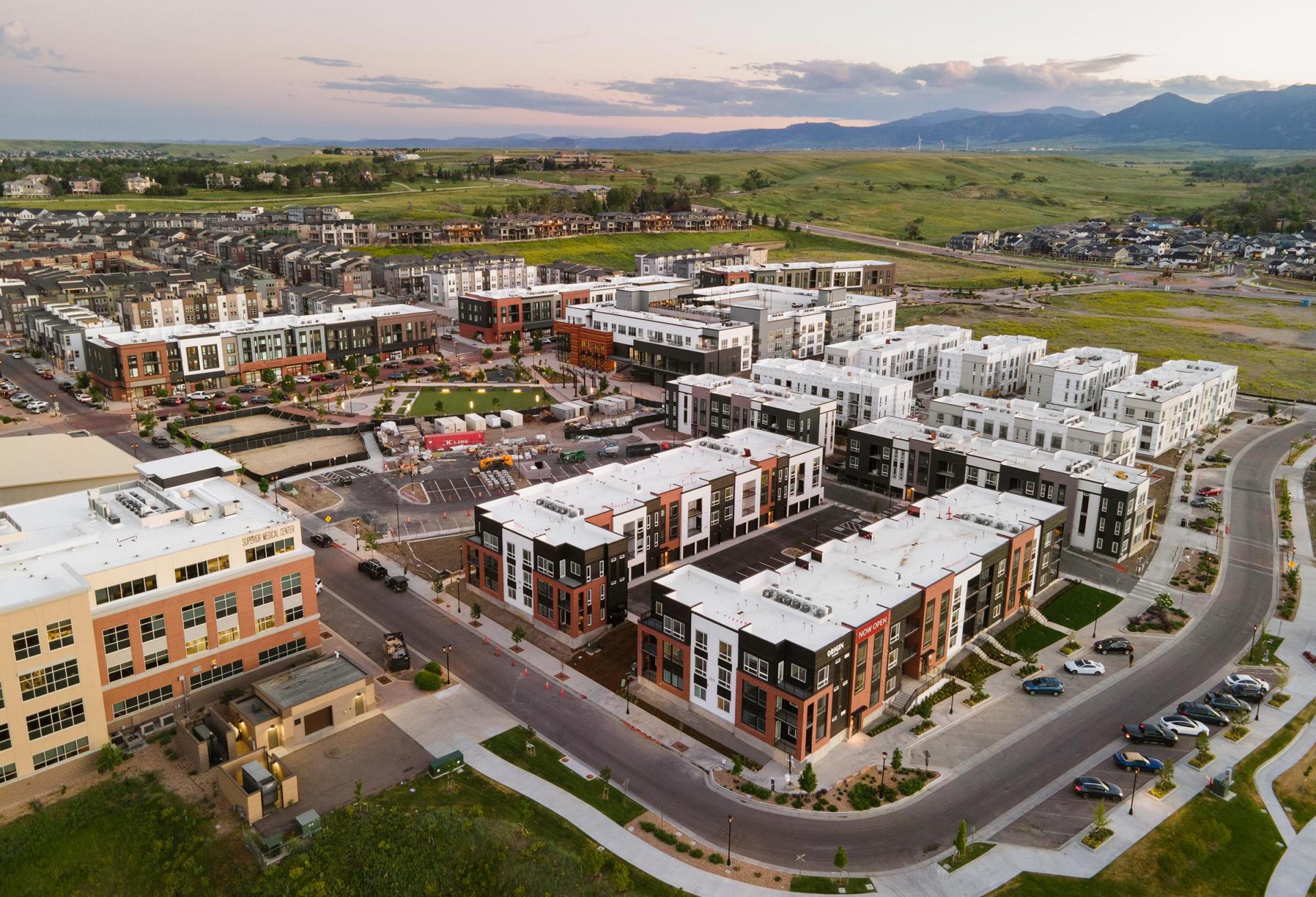 An aerial shot of the under-construction Origin at Downtown Superior project.