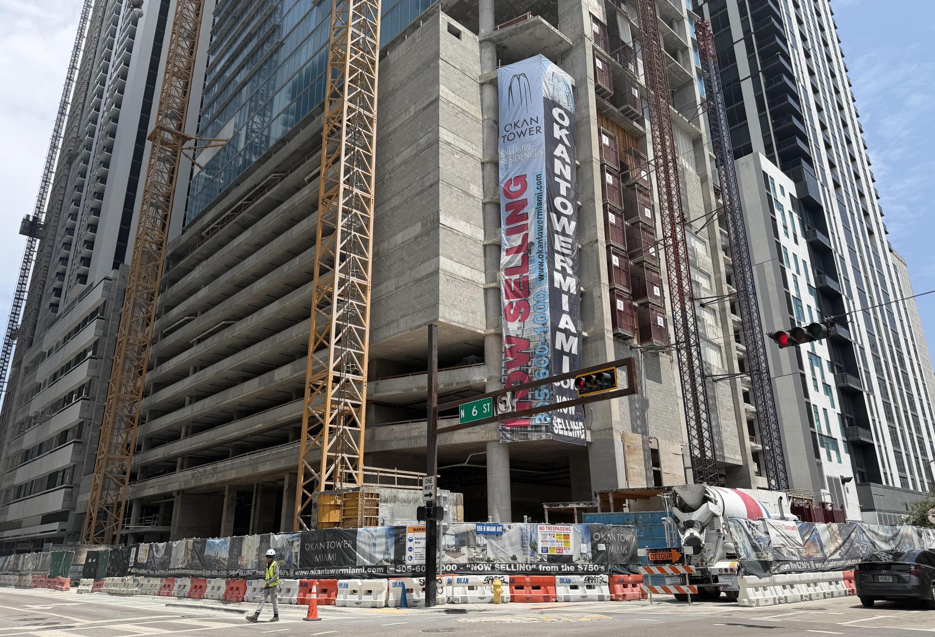 The Okan Tower luxury condo project under construction July 2026.