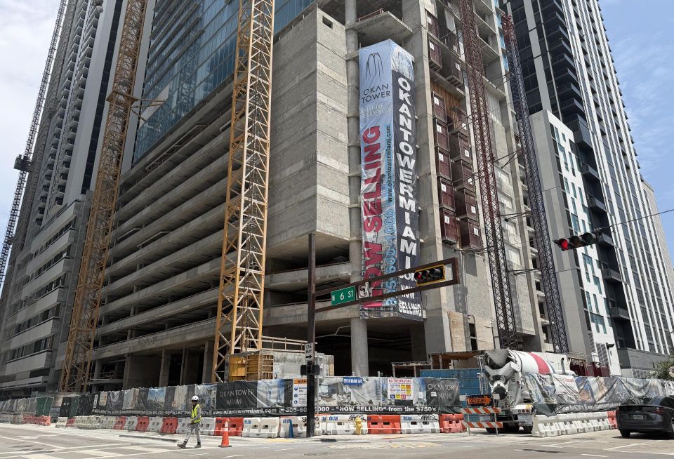 The Okan Tower luxury condo project under construction July 2026.