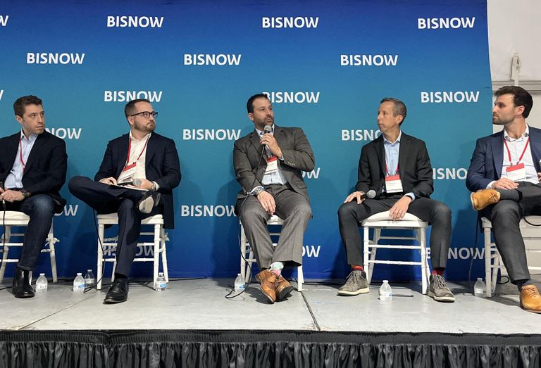 Faropoint's Ohad Porat, Solar Landscape's Mark Schottinger, Rockefeller Group's Heath Abrahamson, KSS Architects' Scot Murdoch and ARCO Design/Build's Jim Wyatt on stage at 2505 Bruckner for Bisnow's 2023 Northeast Industrial and Logistics event.