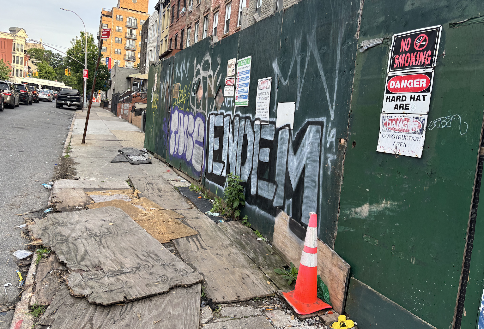 The NYC Department of Buildings issued a violation to Second Development Services for tripping hazards at its abandoned charter school project in in Brooklyn's South Slope.