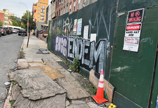The NYC Department of Buildings issued a violation to Second Development Services for tripping hazards at its abandoned charter school project in in Brooklyn's South Slope.